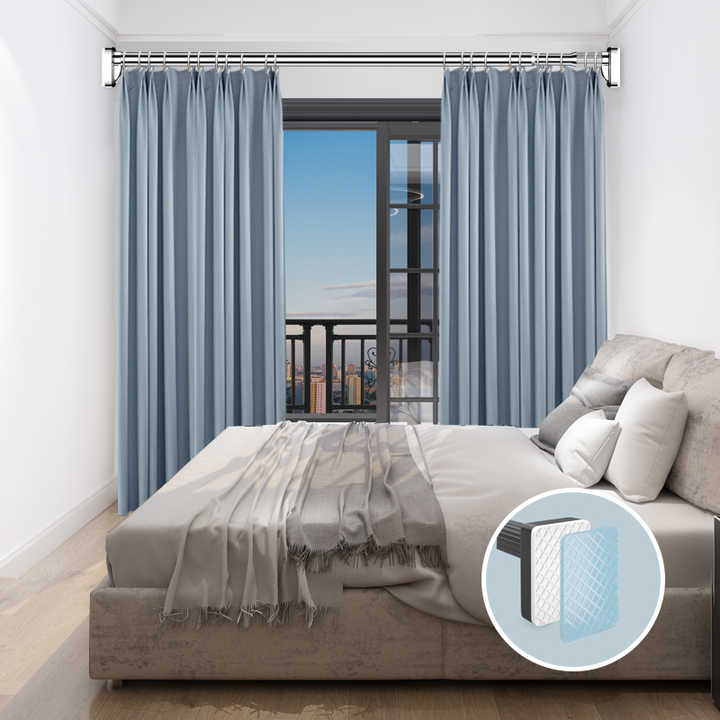Extendable Tension Rod along with curtain mounted on a balcony door in a bedroom