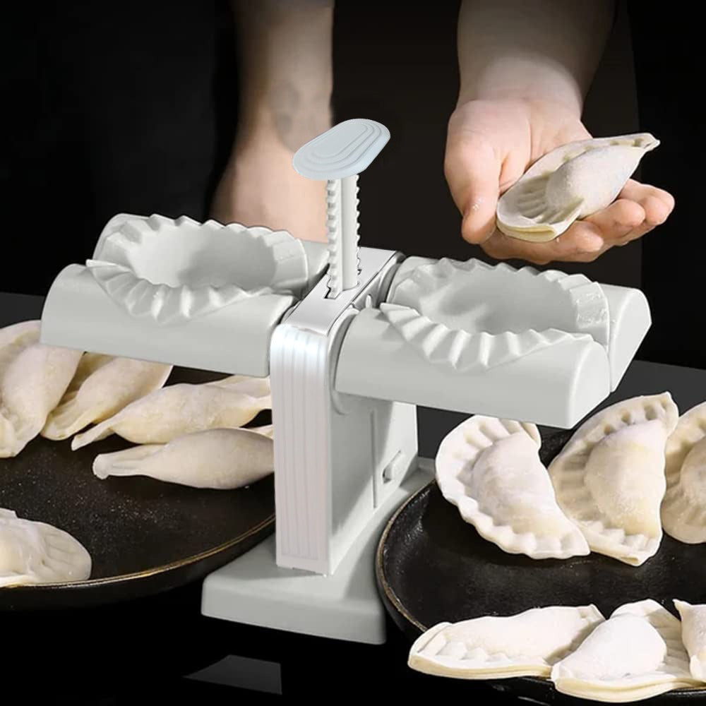 Someone holding Dumpling that was baked with Double Head Semi Automatic Dumpling Maker Mould