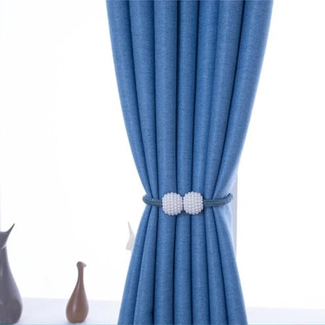 A curtain tied neatly using Magnetic Curtain Binding Rope