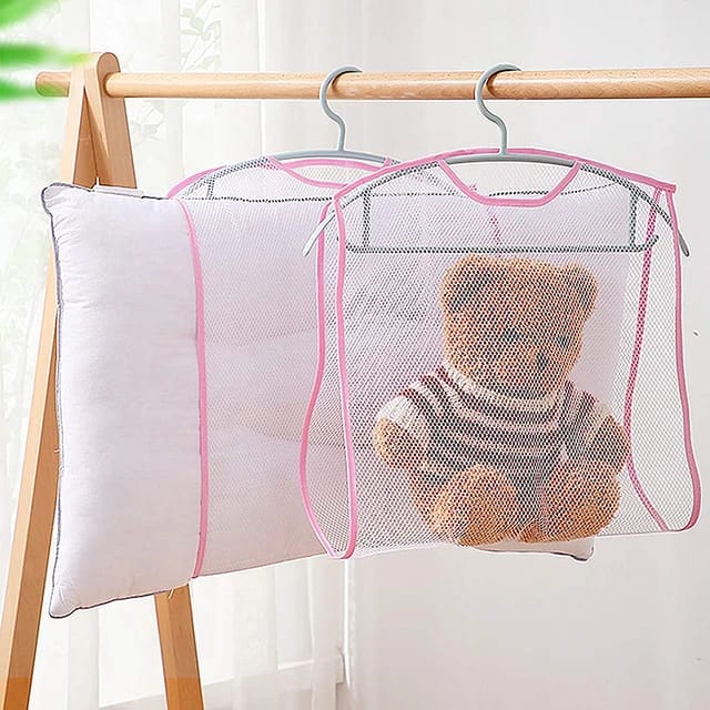 Two Toy and Pillow Drying Net with pillow and doll in it hung on a wooden stand 