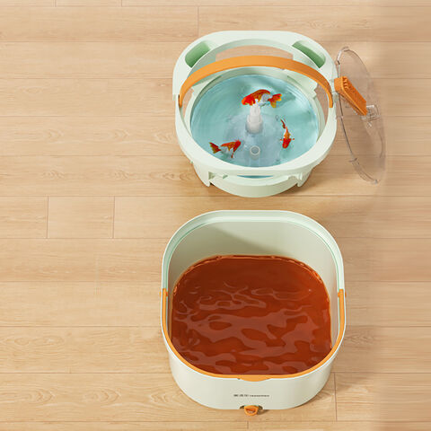 The Bucket of Spin Mop placed on a floor with dirt water in the drain compartment and clean water on the spin compartment 