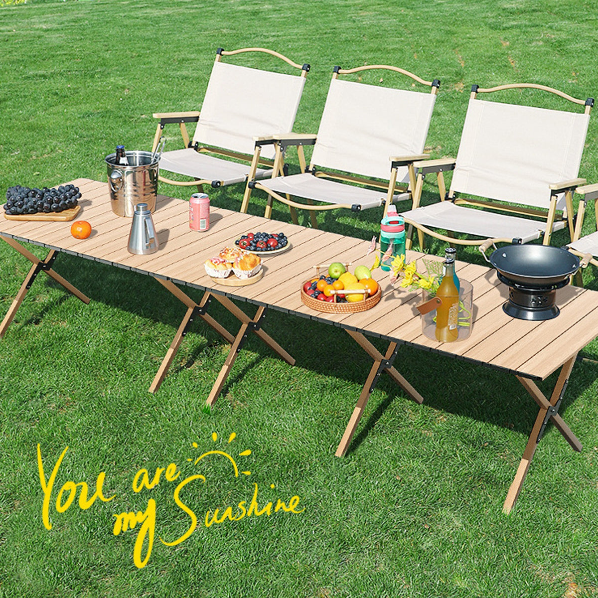 A portable folding chair and table set with food arranged on top