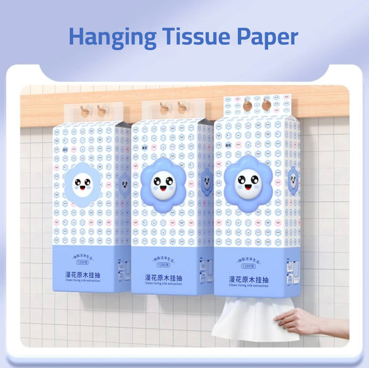 Three sets of Wood Pulp Tissue Papers hanging on a wall and a person pulling out a tissue from it 