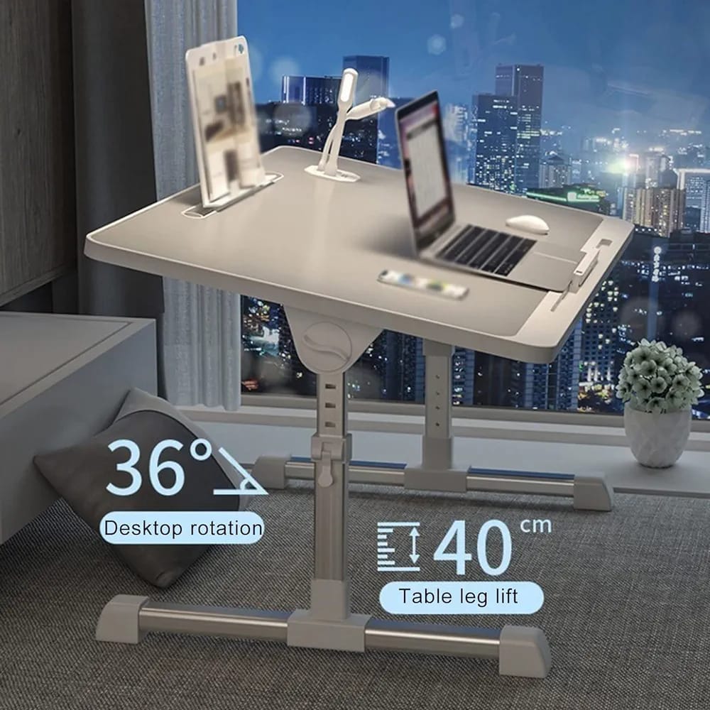 An adjustable bed laptop table with a laptop  on a desk. The table is foldable and designed for computer work, study, reading, and other tasks