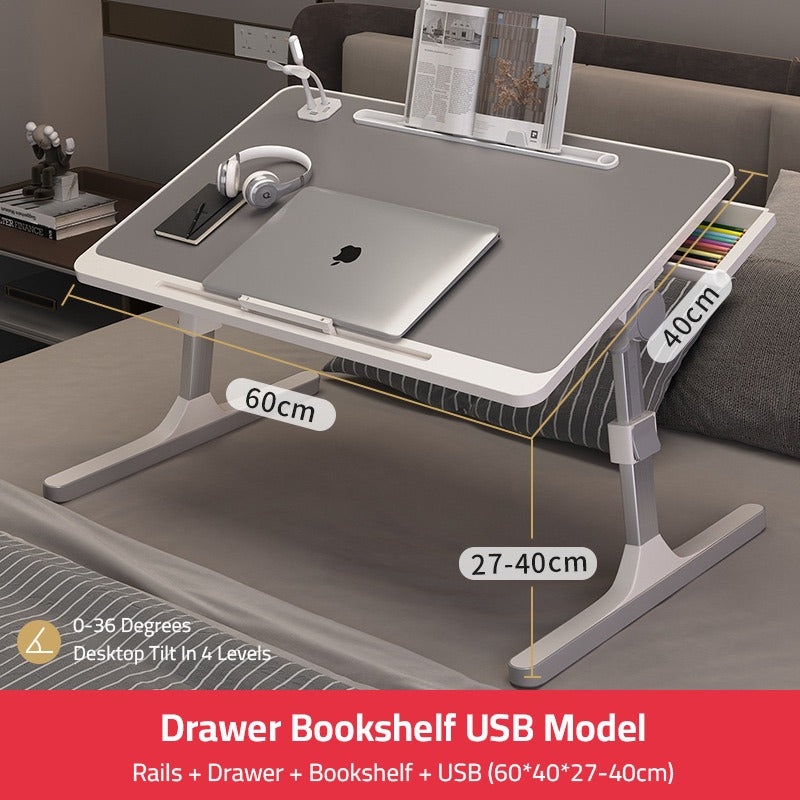 Laptop, headset, and book neatly arranged on the Adjustable Bed Laptop Table – a Foldable Lifting Desk for a versatile and comfortable workspace