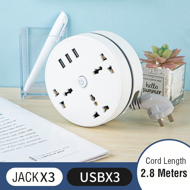 Round Universal Converter Power Strip Adapter - Extension Socket 3 Outlets with 3 USB Ports placed on desk
