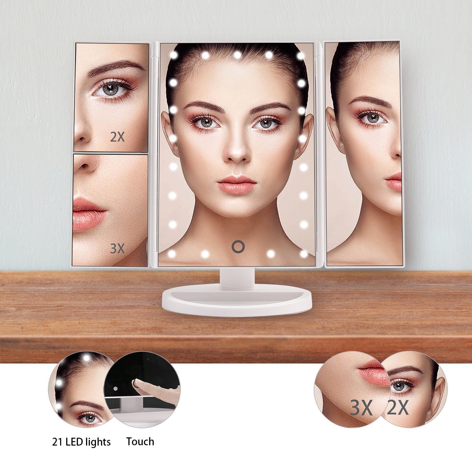 A woman's face reflected in a Tri-fold Makeup Mirror with LED Lights, which is placed on a desk
