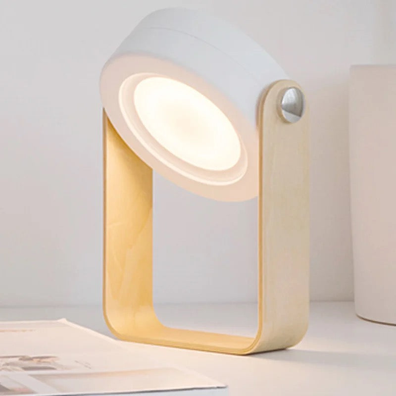Retractable Table Lamp with USB Rechargeable placed on the table 