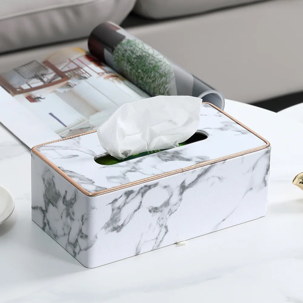 Rectangular Tissue Box Holder displayed on the table next to a book