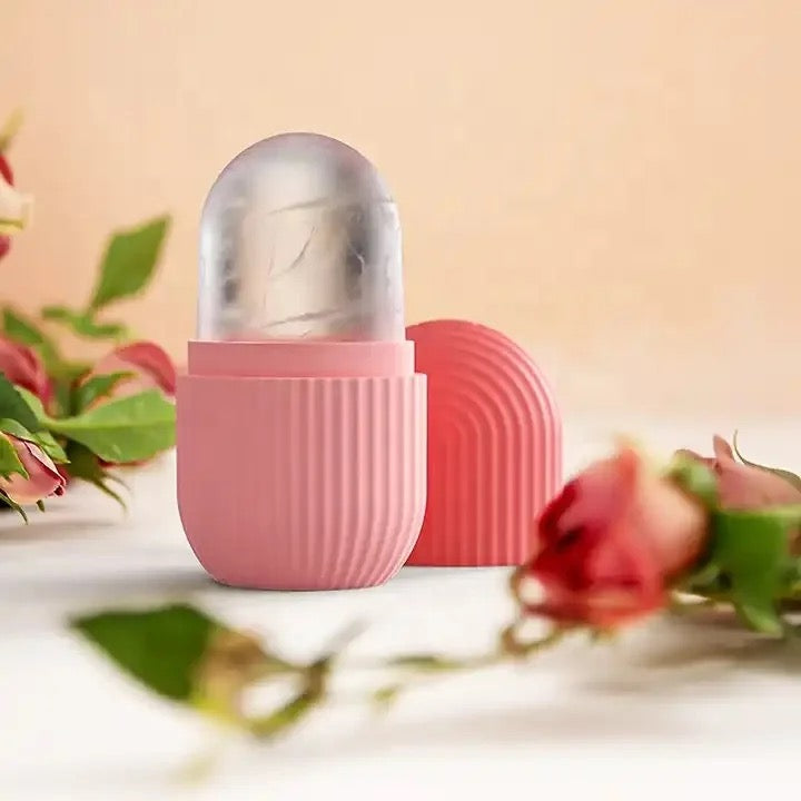 Silicone Ice Roller Massager placed on the table next to a rose flower