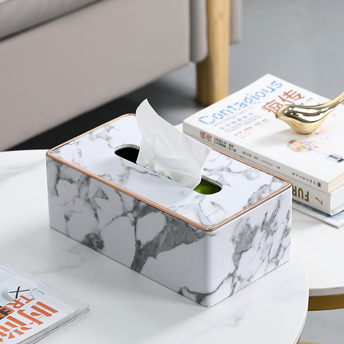Rectangular Tissue Box Holder placed on the table next to a book
