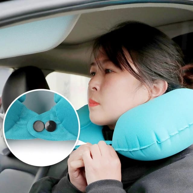 A woman wearing an Inflatable U-Shape Travel Neck Pillow while in a car.