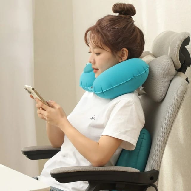 A girl wearing the Inflatable U-Shape Travel Neck Pillow