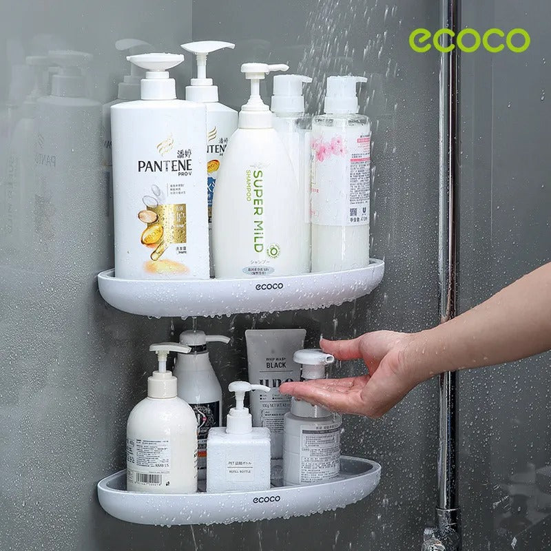 a women using the products thats kept on bathroom corner rack