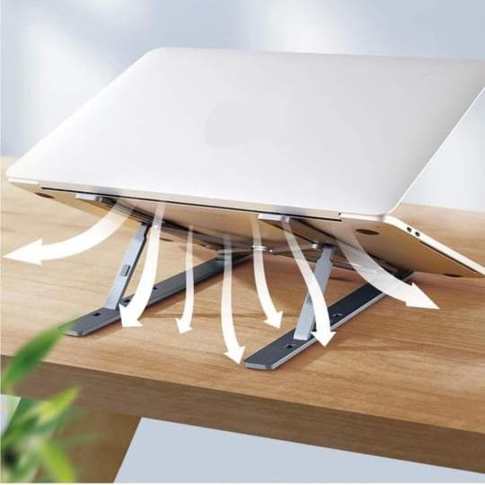 A Laptop s Placed at Foldable Aluminum  Laptop Holder Rack.