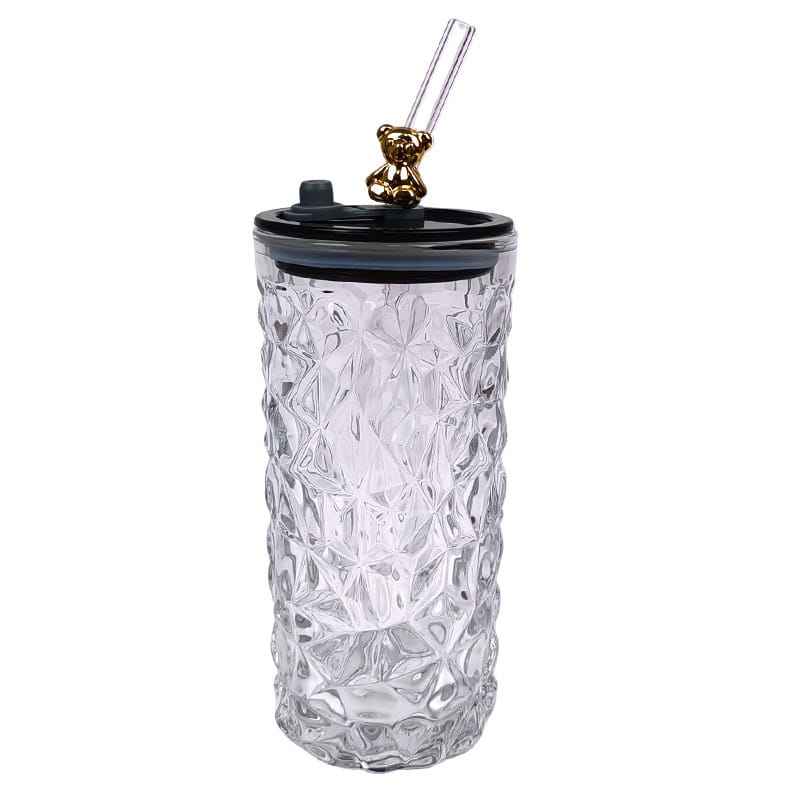 Drinking Glass Tumbler With Straw and Lid in White Color.