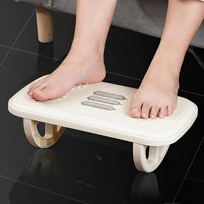 A Person is Resting On the Foot Massager Stool.