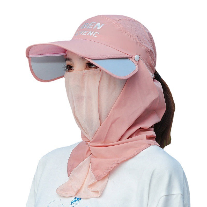 A Woman is Wearing Wide Brim Bucket Hat with Neck Cover.