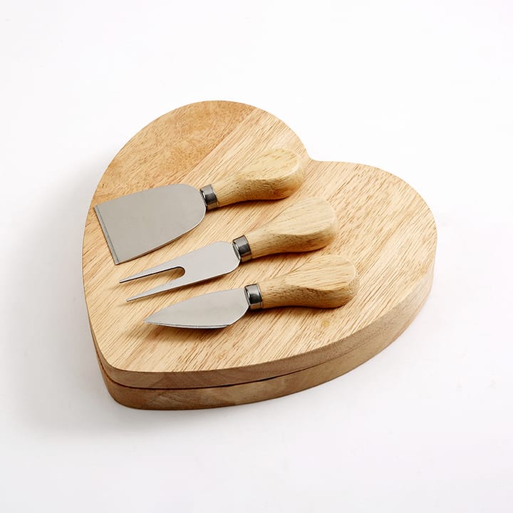 Heart-shaped wooden cheese board with built-in knife storage.