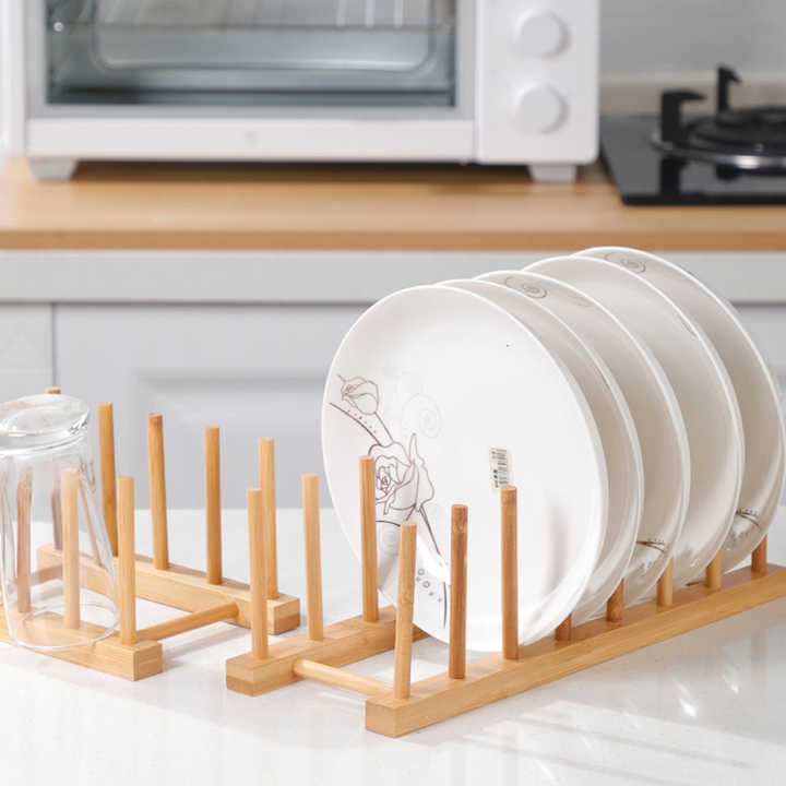 Wooden Dish Holder Holding Glasses and Plates.