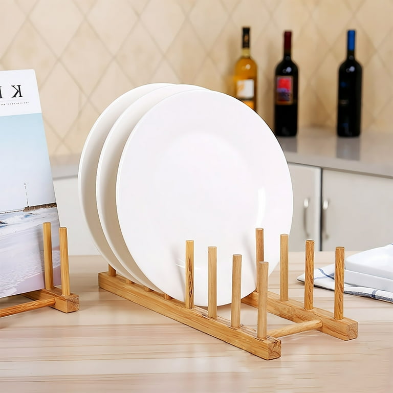 A Wooden Dish Holder Holding Plates