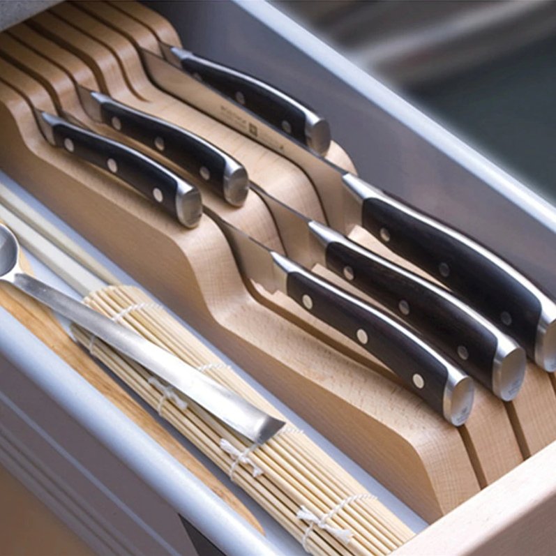 Knives are Organized in a Wooden Knife Holder.