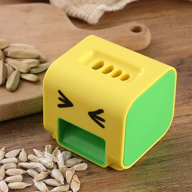 Yellow Electric Seed Peeler.