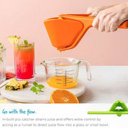 A Person is Squeezing Lemon Using Manual Lemon Fruit Squeezer.