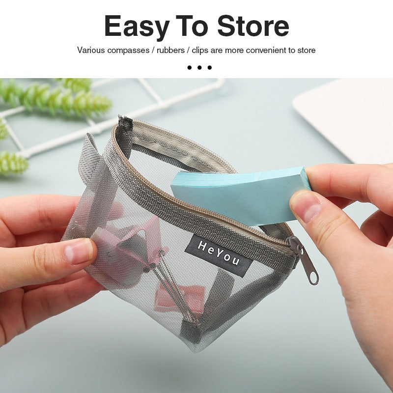 A person holding a Mini Zipper Pouch mesh bag, with a paper inside
