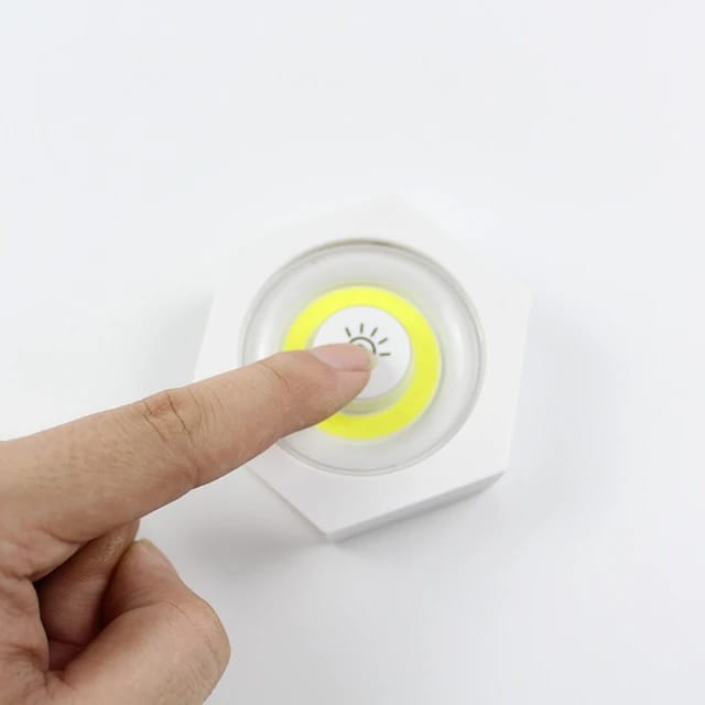 some one pressing switch of the Dimmable LED Under Cabinet Light with Remote Control