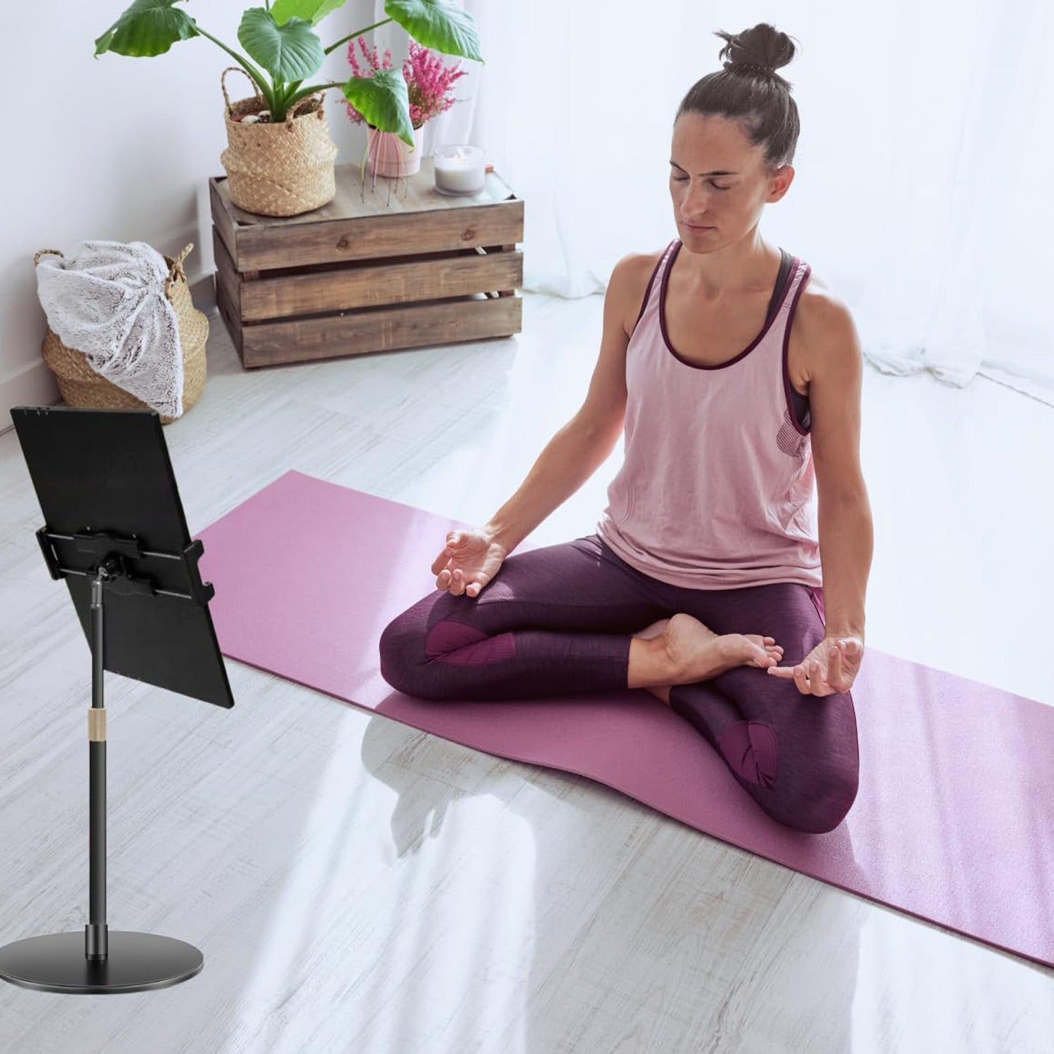 Women Recording her Yoga Poses Using Selfie Tablet Holder.