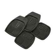 Four black car floor mats with textured design on a white background