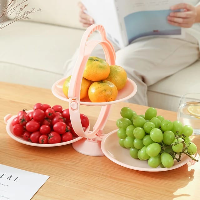 Fruits are arranged in a creative folding fruit plate.