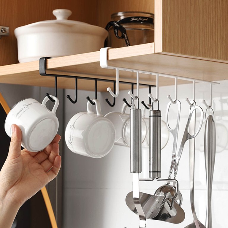 Keep your cups and spoons organized with a metal hanger rack featuring 6 hooks on a kitchen shelf