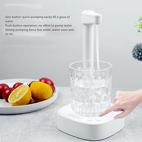lady pressing the button to fill her glass of water with desktop water dispenser