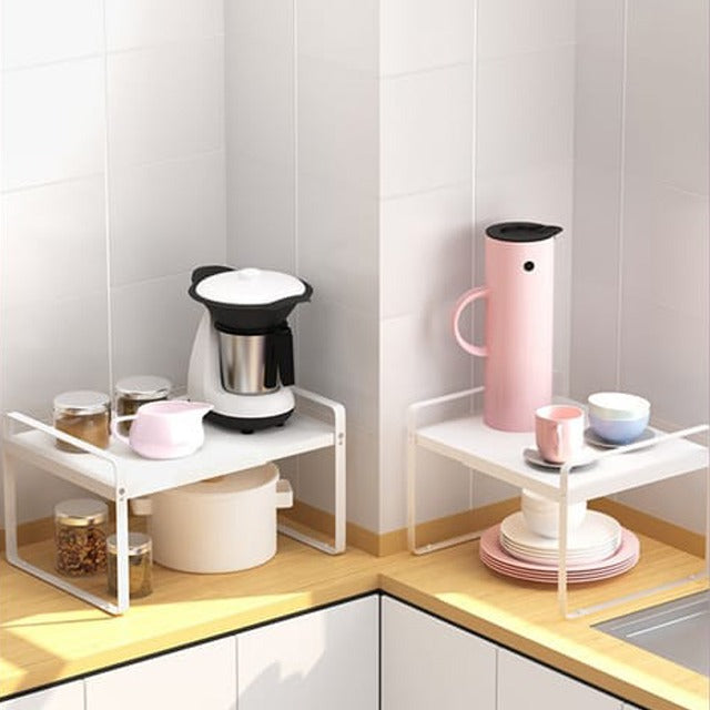 Kitchen Dishes are organized in a Retractable Countertop Storage.