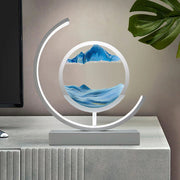 Quicksand 3D Table Lamp placed next to a television 