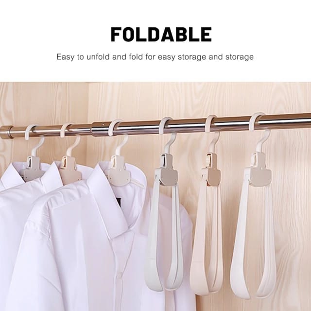 Cloths are Hanging on the Foldable Travel Hangers.