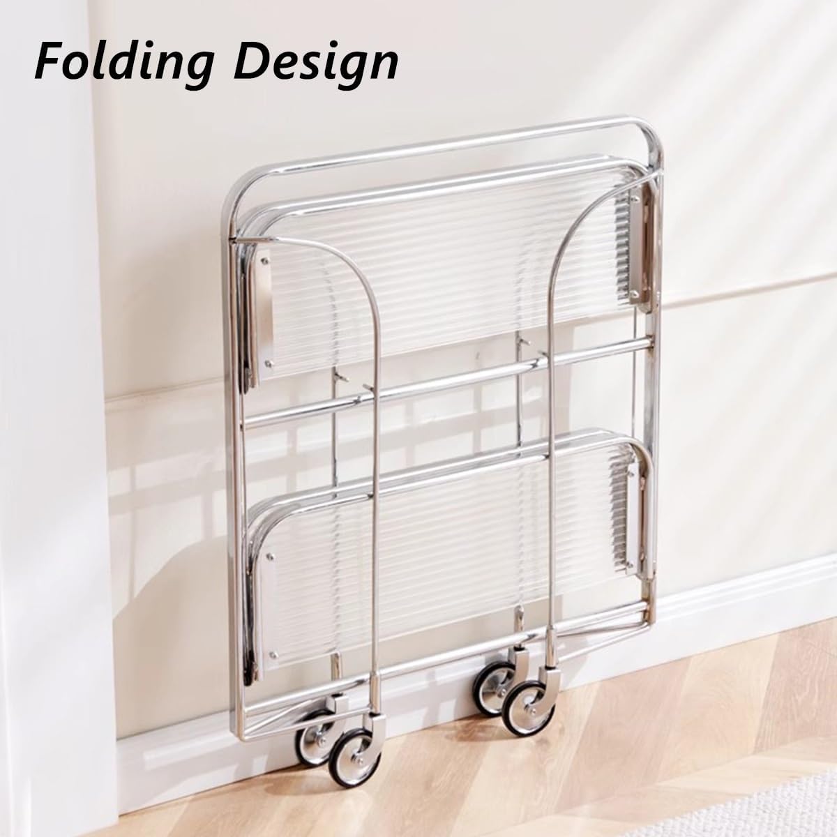  folding 2-tier serving trolley with a chrome finish, glass shelves, and rolling wheels.