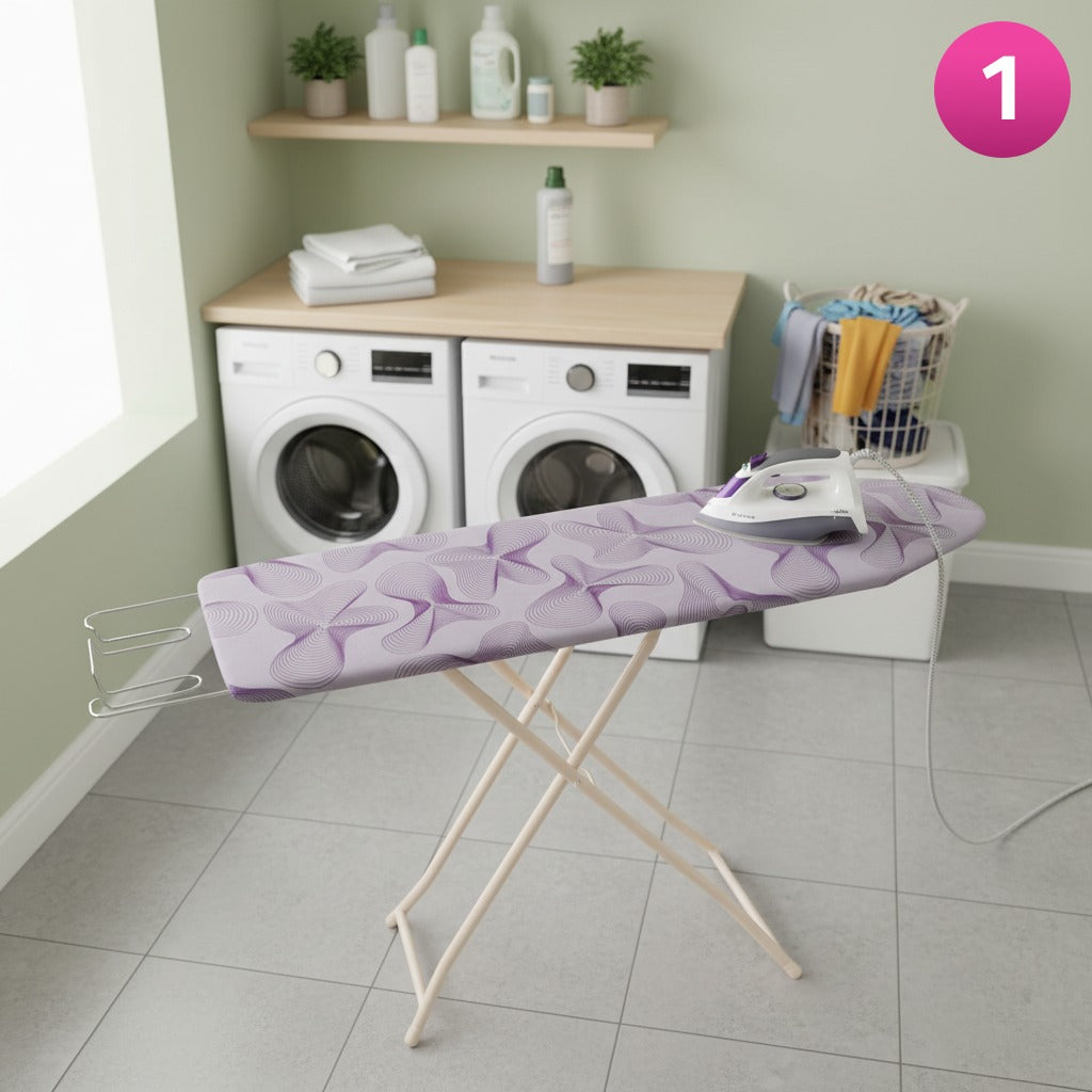 Heavy-duty folding ironing board with iron and clothes set up in a laundry area.