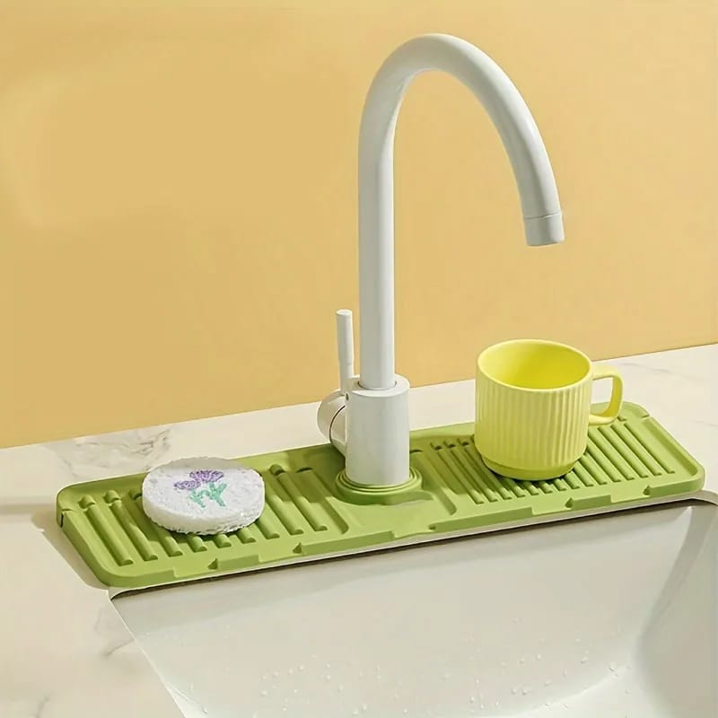 Silicone Sink Faucet Drain Mat with Cup On it.