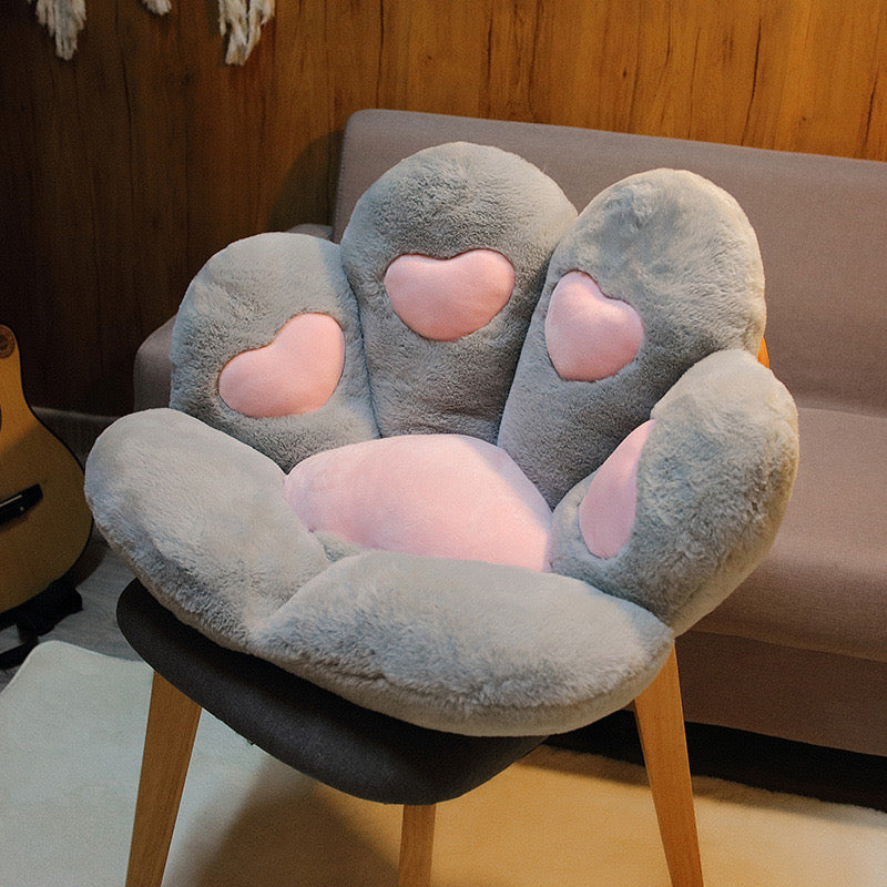 Grey cat paw cute cushion on chair