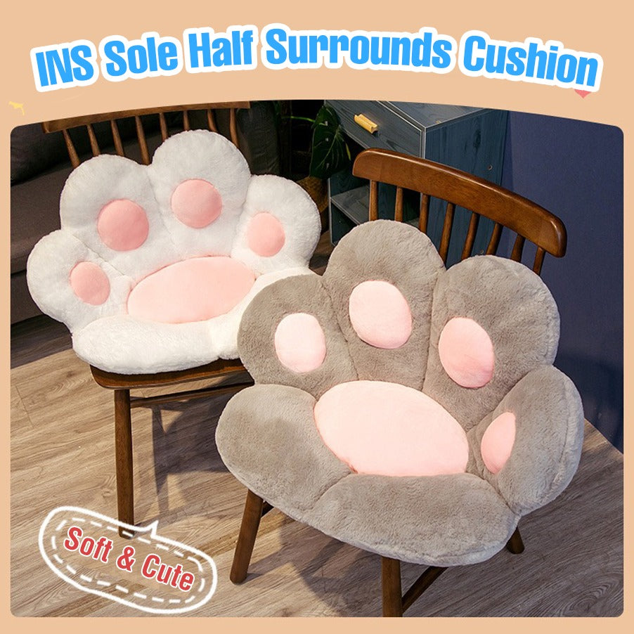 White and grey cute cat paw cushion on chair