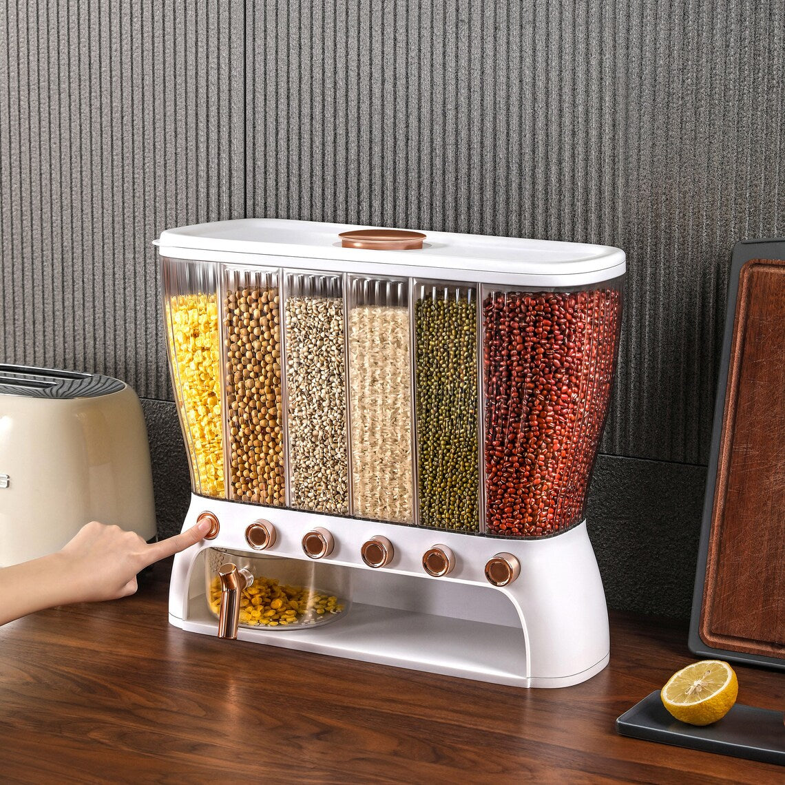Someone taking something from the 6 Grids ~12 Kg Rice Bucket Grain Organizer