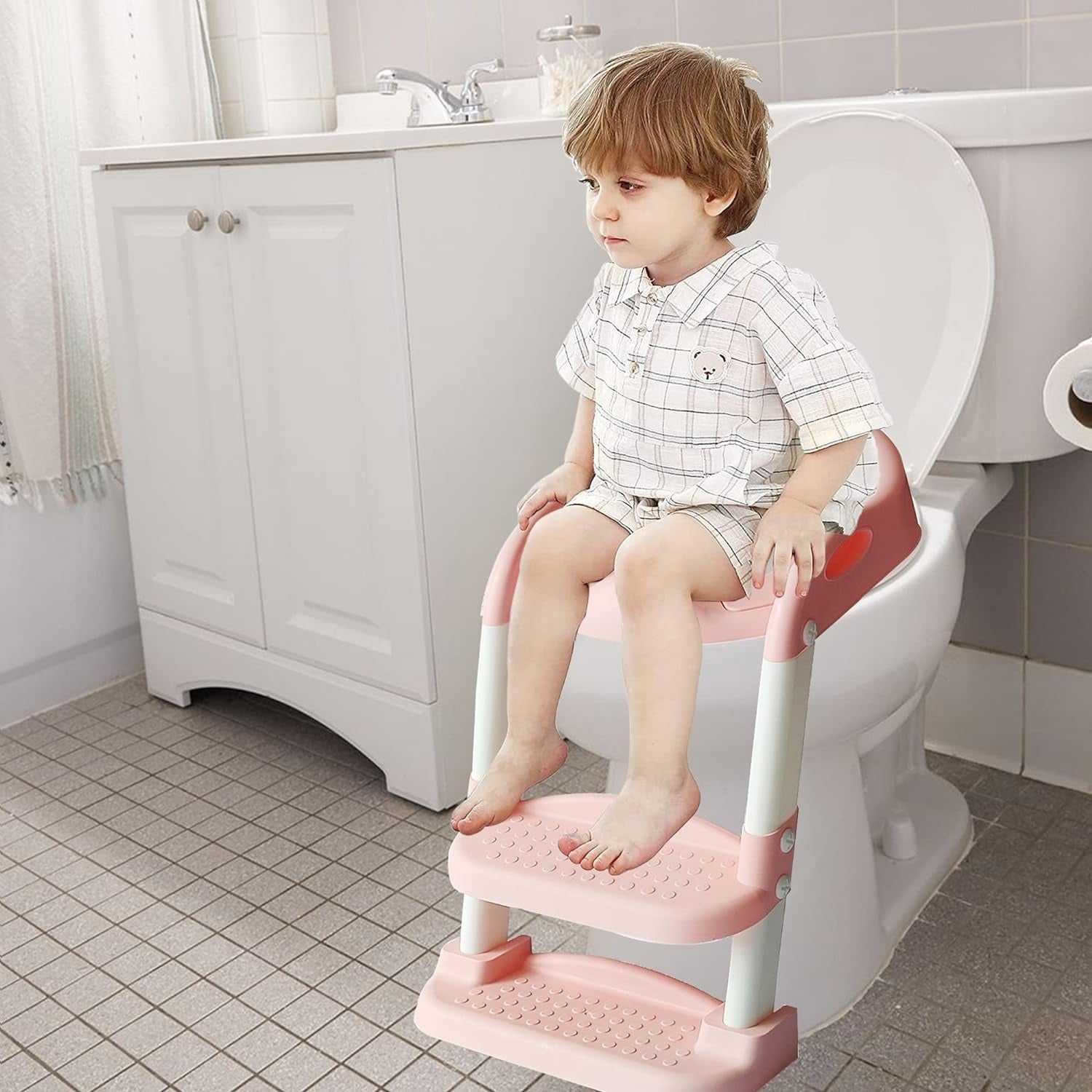 child sitting on Toilet Potty Trainer Seat 