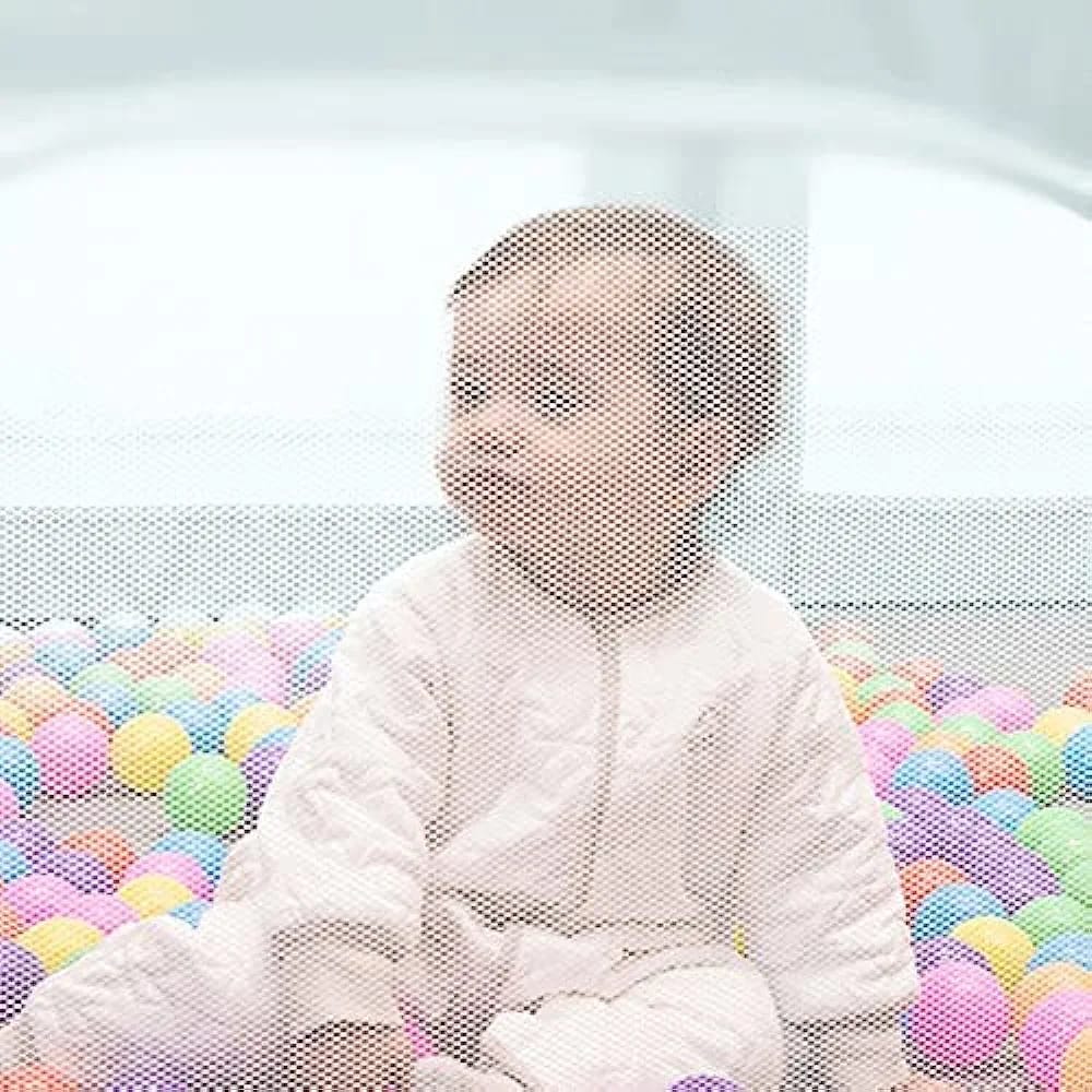 Baby Inside a Baby Playpen.
