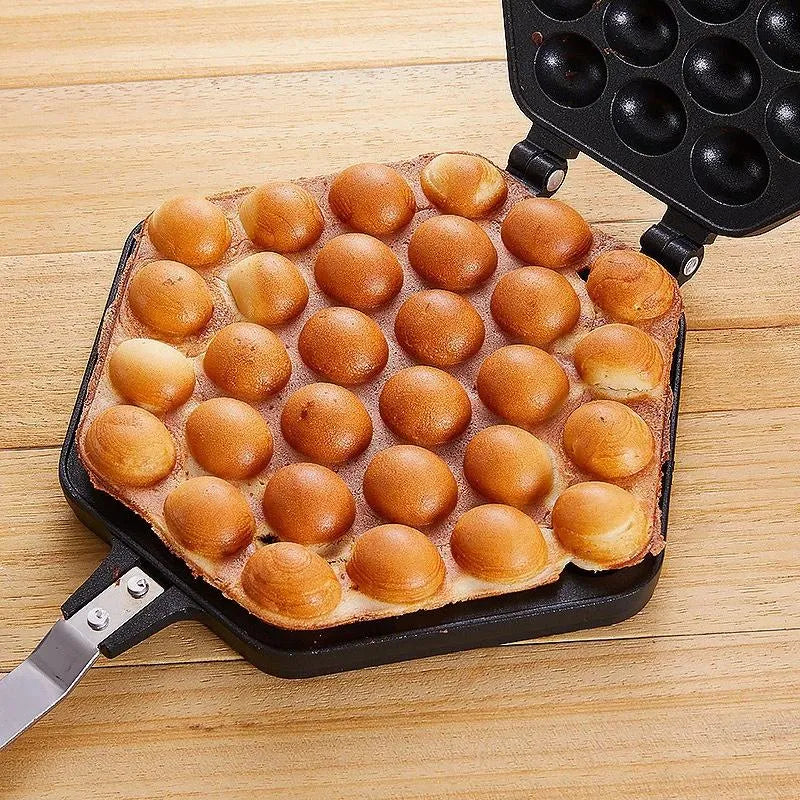 Non-stick Egg Puffs Maker Pan with food on it