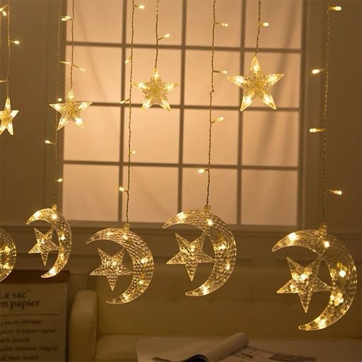 LED Star and Moon String Lights hanged indoors