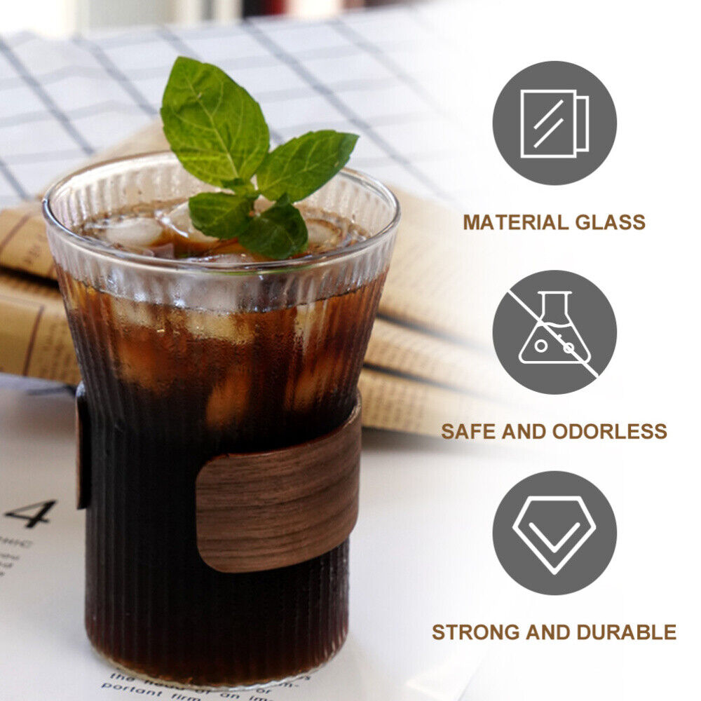 Wide Mouth Glass Coffee Mug with liquid, ice, and mint leaves