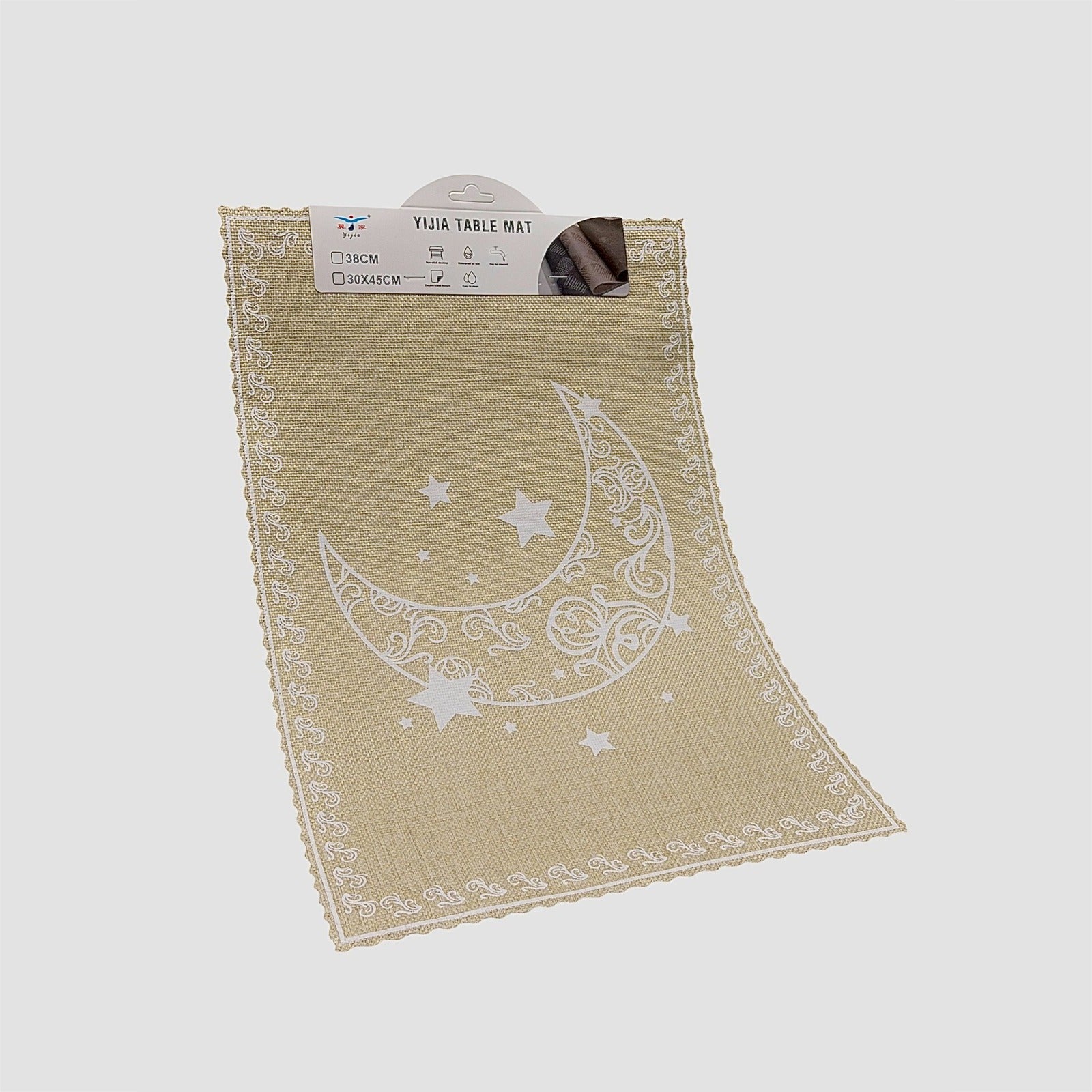 Beige table mat with star and moon design on a white background
